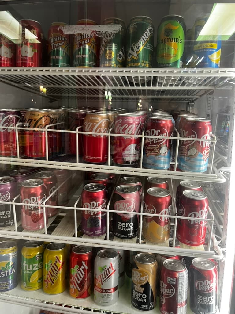 A convenience-store fridge stocked with Dr Pepper and other diet sodas